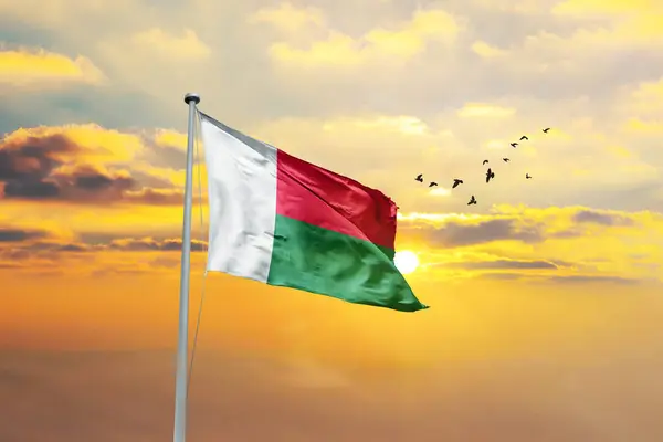 Depositphotos 769748216 Stock Photo Waving Flag Madagascar Sunset Sunrise